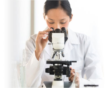 scientist with microscope